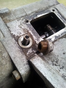 Removing the selector shaft detent spring and plunger