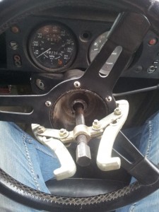 Using a puller to remove the steering wheel